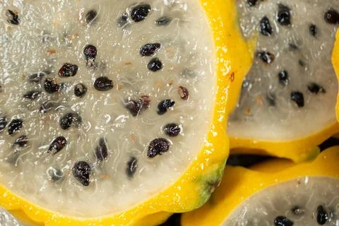 Full frame pattern of fresh sliced yellow pitahaya. Stock Photos