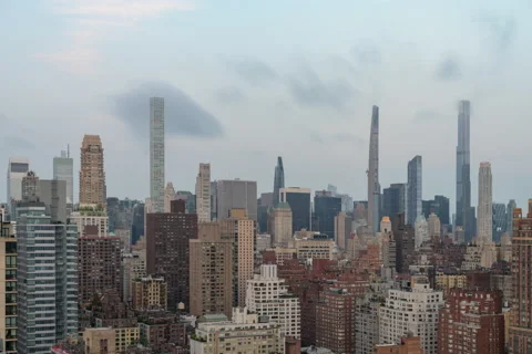 Full frame Penumbral Eclipse Moon over Midtown Skyline (2 of 3) Stock Footage 155159298