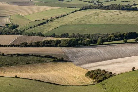 A full frame photograph looking down at a patchwork landscape in rural Suss.. Fotos de archivo