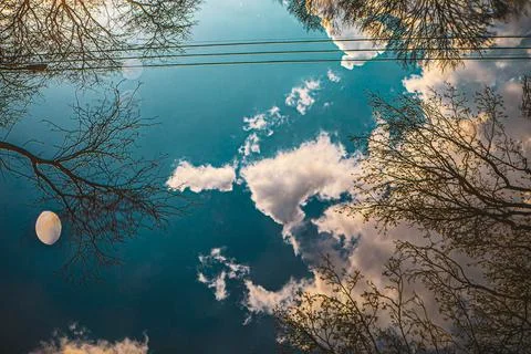 Full frame reflection of sky on puddle Stock Photos