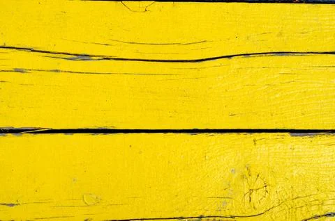 Full frame shot of rusty   yellow painted wooden timber  wall . Stock Photos