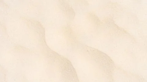 Full frame shot. Top down view sand texture on the beach in summer. Stock Photos