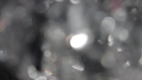 Full-frame silver bokeh flare Stockbeeldmateriaal 318519623