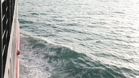 Full frame slow motion video of rough ocean surface with swirling whitewash Stock Footage 343820228