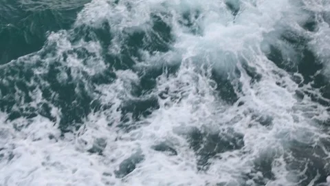 Full frame slow motion video of rough ocean surface texture Stock Footage 343917953