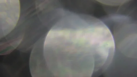 Full-frame sparkling bokeh from a close-up of white Vídeo Stock 309268638