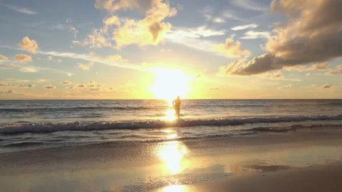 Full frame sunset sea beach sand clear cloud water wave blue sky background Stock Footage 153379433