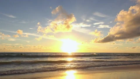 Full frame sunset sea beach sand clear cloud water wave blue sky background Stock Footage 153379435