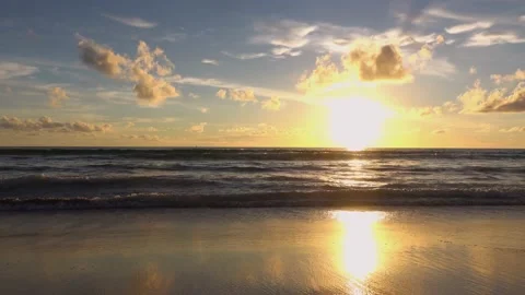 Full frame sunset sea beach sand clear cloud blue sky background Stock Footage 153379447