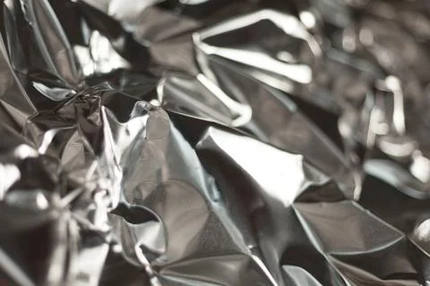 Full frame take of a sheeT of crumpled silver aluminum foil Stock Photos
