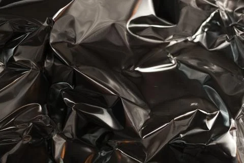 Full frame take of a sheeT of crumpled silver aluminum foil Stock Photos
