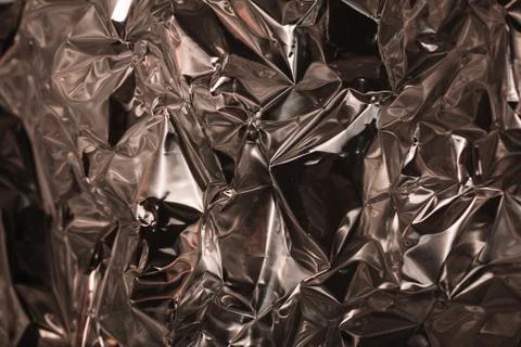 Full frame take of a sheeT of crumpled silver aluminum foil Foto stock