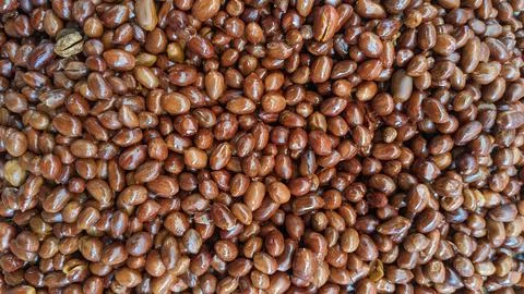 Full frame of tasty fried peeled peanuts placed in a pile on the surface Stock Photos