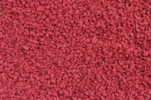 Full frame texture of decorative red rubble for garden decoration Stock Photos