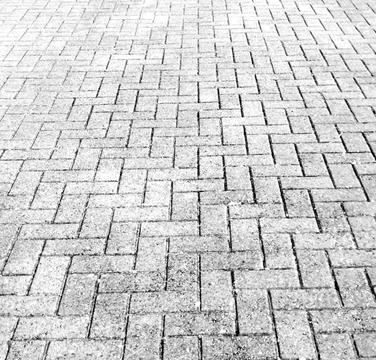 Full frame texture image of monochrome herringbone paving blocks with copy space Stock Photos