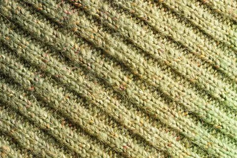 Full frame of the texture of knitted fabric made of wool thread. 스톡 사진