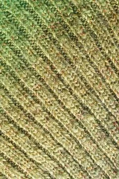 Full frame of the texture of knitted fabric made of wool thread. Stock Photos