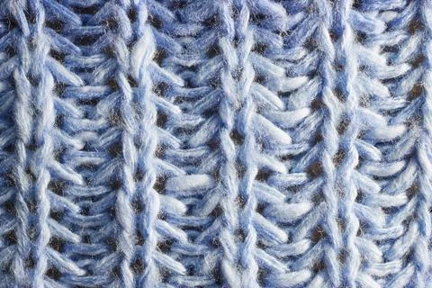 Full frame of the texture of knitted fabric made of wool thread. 스톡 사진