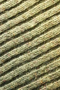 Full frame of the texture of knitted fabric made of wool thread. 스톡 사진