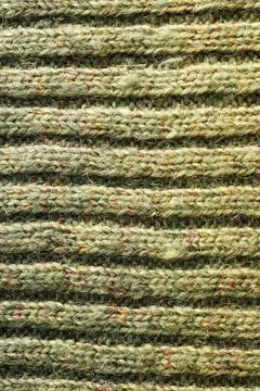 Full frame of the texture of knitted fabric made of wool thread. Stock Photos