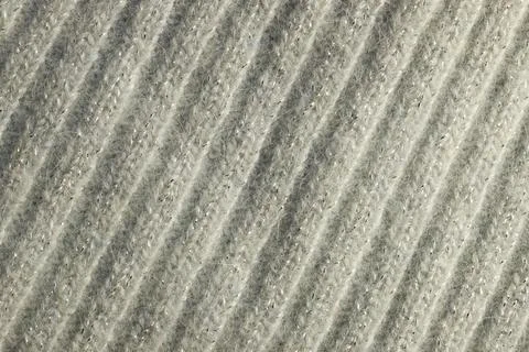 Full frame of the texture of knitted fabric made of wool thread. Stock Photos