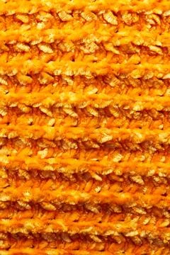 Full frame of the texture of knitted fabric made of wool thread. Stock Photos