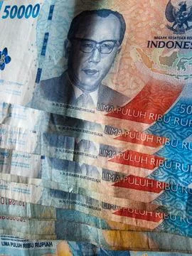 Full frame texture of multiple Indonesian fifty thousand rupiah banknotes Stock Photos