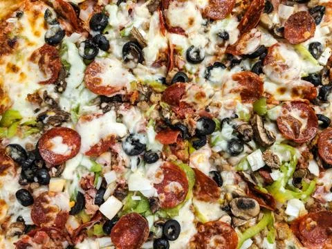 Full Frame Texture of Pizza with Multiple Toppings Stock Photos