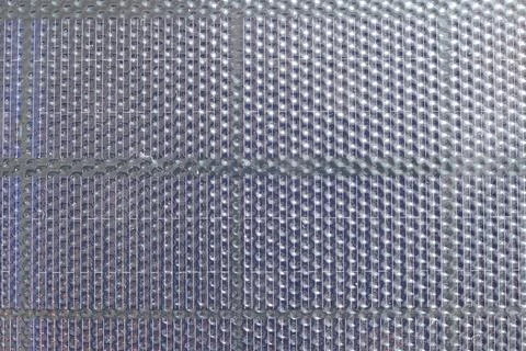 Full frame texture of portable solar panel cell. Stock Photos