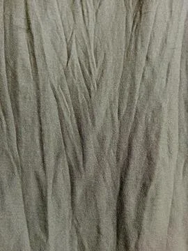 Full Frame Texture of Wrinkled and Pleated Olive Green Fabric Stock Photos