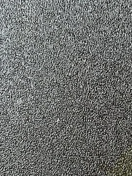 ​Full Frame of Textured Black Plastic Surface or Matte Metallic Background Stock Photos