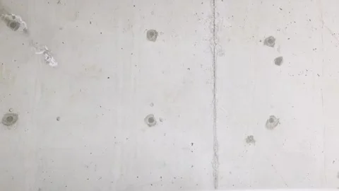Full frame textured concrete wall background with copy space 動画素材 338307486