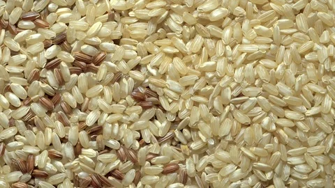 Full-frame of two types of Brown Rice grains in rotation Stock Footage 123682507