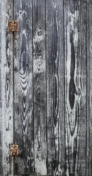 Full-frame vertical shot of rustic, dark brown wooden boards door featuring.. Stock Photos