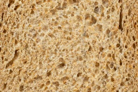 Full frame view of fresh baked porous rye bread structure close-up Stock Photos