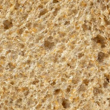 Full frame view of fresh baked porous rye bread structure close-up Stock Photos