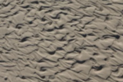 Full frame of wave pattern on sand Stock Photos