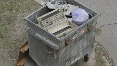 A full garbage can with old computer equipment. Stock Footage 86605620
