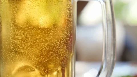 Full glass of beer bubbles close-up Stock Footage 82643559