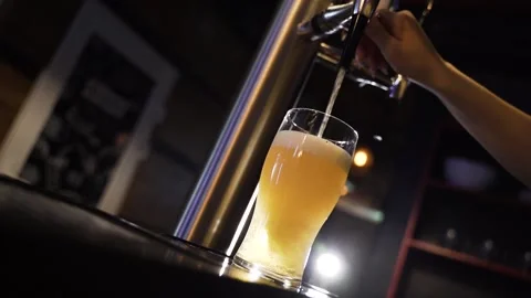 Full glass of cool beer Stock Footage 153974243