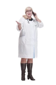 In full growth. attending doctor using her smartphone. Stock Photos