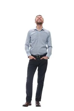 In full growth. brooding businessman looking somewhere up Stock Photos
