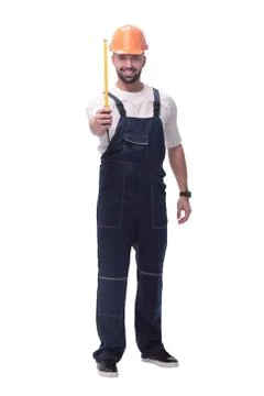In full growth. man Builder with construction tape measure Stock Photos