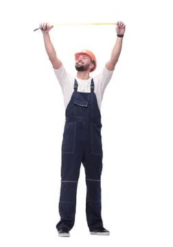 In full growth. man Builder with construction tape measure Stock Photos