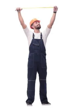 In full growth. man Builder with construction tape measure Stock Photos