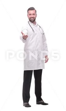 In full growth.a successful medical doctor welcoming you. Stock Photos