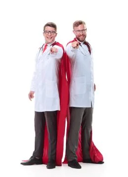 In full growth. two super doctors pointing at you Stock Photos
