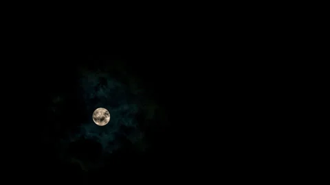 Full Harvest Super Moon Rises through Inky Black Night with Clouds Timelapse Stock Footage 285685736