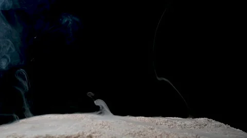 A full HD 1080p Slow motion video of a fuse wire being burnt under river sand Stock Footage 201491595
