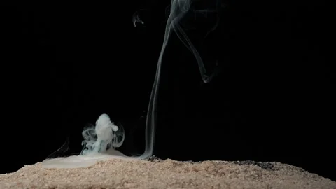 A full HD 1080p Slow motion video of a fuse wire being burnt under river sand Stock Footage 201491860